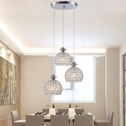 Lampada a sospensione moderna e contemporanea in cristallo a 3 teste