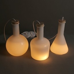 Linea di bottiglie di vetro bianco magico creativo contemporaneo e contrattuale Droplight