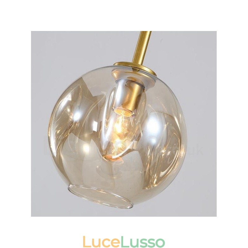 Lampadario moderno contemporaneo a 7 luci con paralume in vetro trasparente e lampada