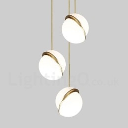 Lampada a sospensione moderna in rame e paralume in vetro