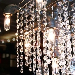 Lampadario in cristallo a 9 luci in stile nordamericano con design a tubi