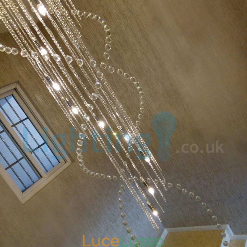 Lampadario moderno contemporaneo a sospensione a filo con luce a goccia di cristallo