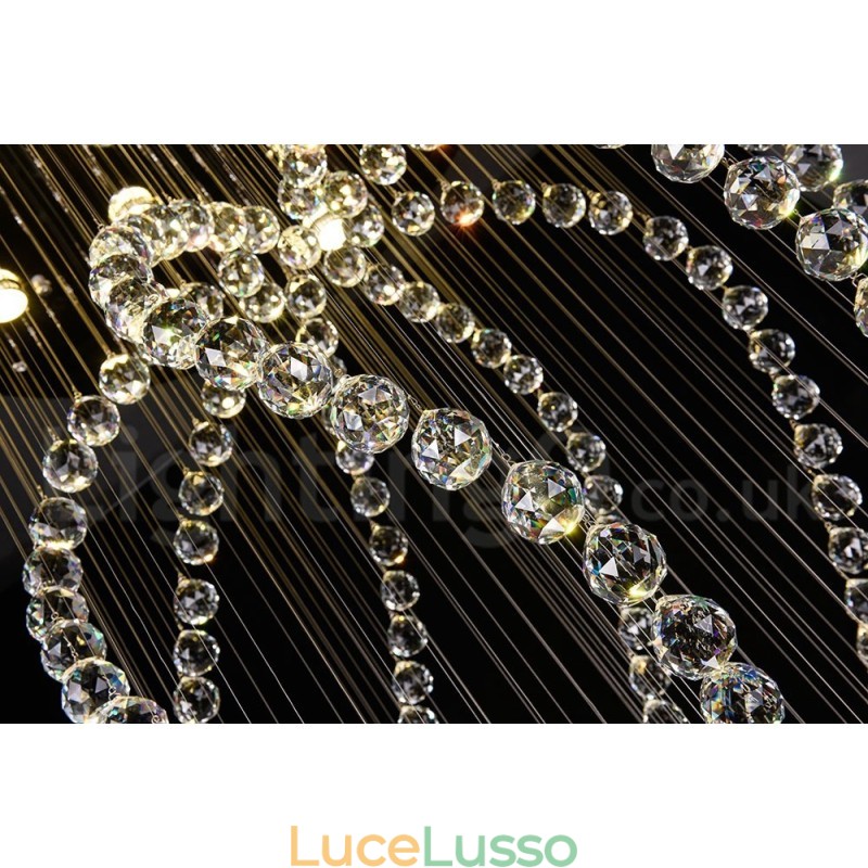 Lampadario moderno contemporaneo a sospensione a filo con luce a goccia di cristallo