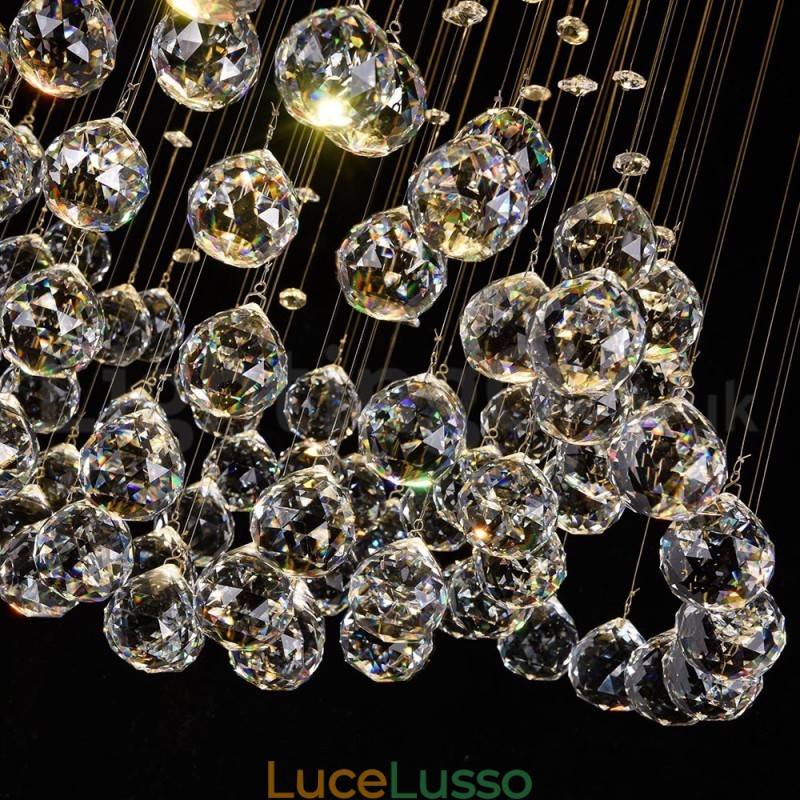 Lampadario moderno contemporaneo a sospensione a filo con luce a goccia di cristallo