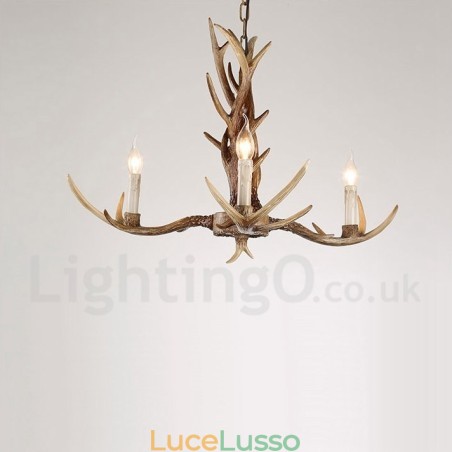Lampadario a candela vintage retrò in corna di cervo artistico rustico a 3 luci Lampadario a candela vintage retrò in corna di cervo artistico rustico a 3 luci
