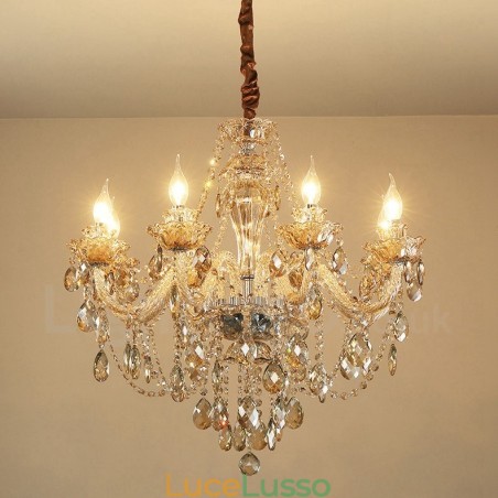 Lampadario elegante in cristallo color cognac con 8 luci Lampadario elegante in cristallo color cognac con 8 luci