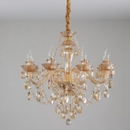 Lampadario elegante in cristallo con 8 candele color ambra e oro chiaro