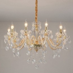 Lampadario in oro con candela in cristallo trasparente