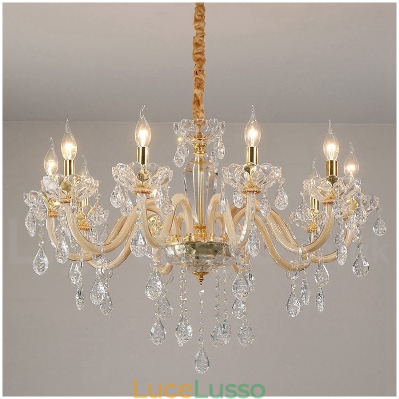 Lampadario in oro con candela in cristallo trasparente