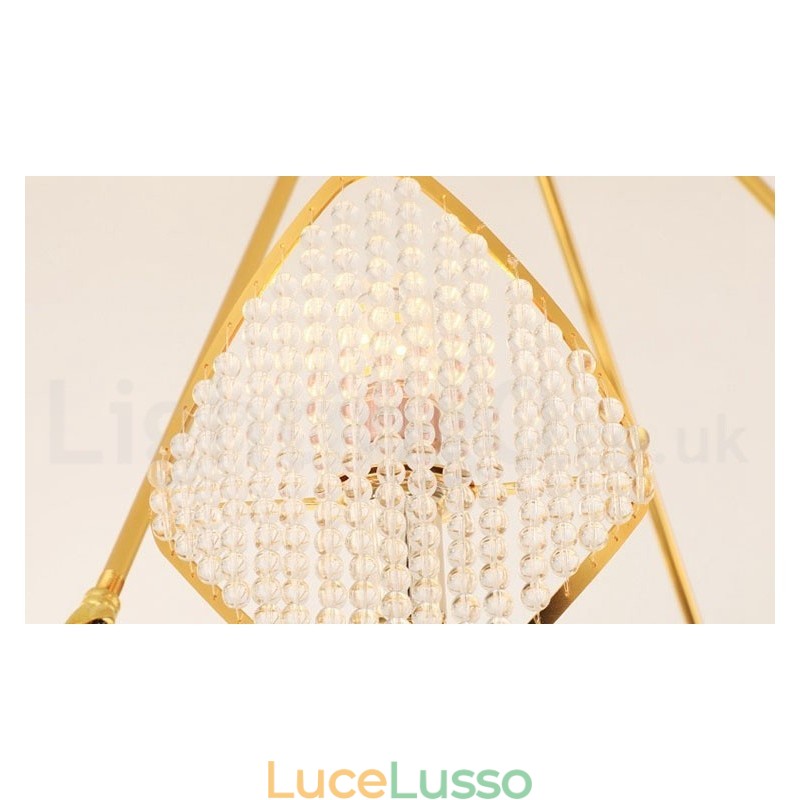 Lampadario a sospensione in cristallo K9 rotondo di lusso postmoderno dorato con paralume in acrilico Sala espositiva