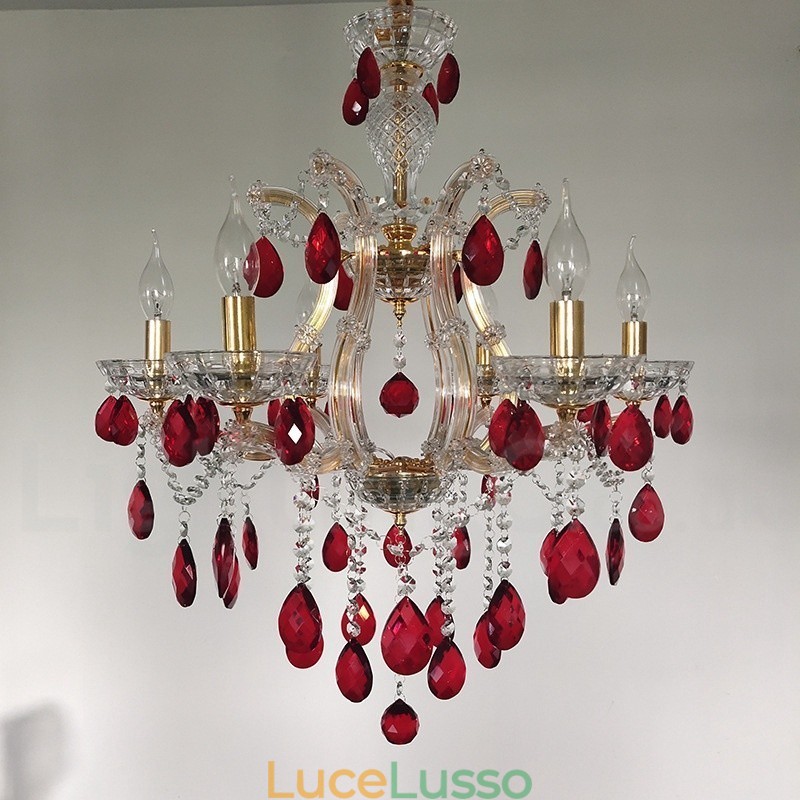 Lampadario a 6 luci con candela dorata e cristallo rosso