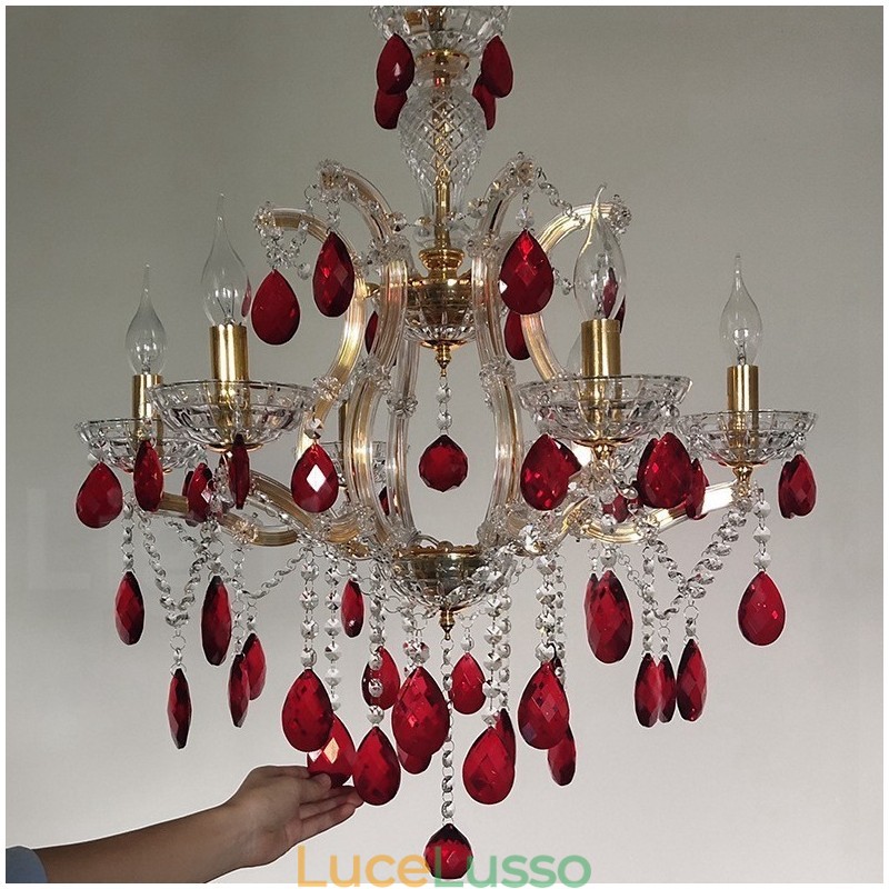 Lampadario a 6 luci con candela dorata e cristallo rosso