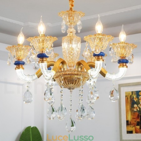 Lampadario moderno contemporaneo a 6 luci con candela color champagne e cristallo Lampadario moderno contemporaneo a 6 luci con candela color champagne e cristallo