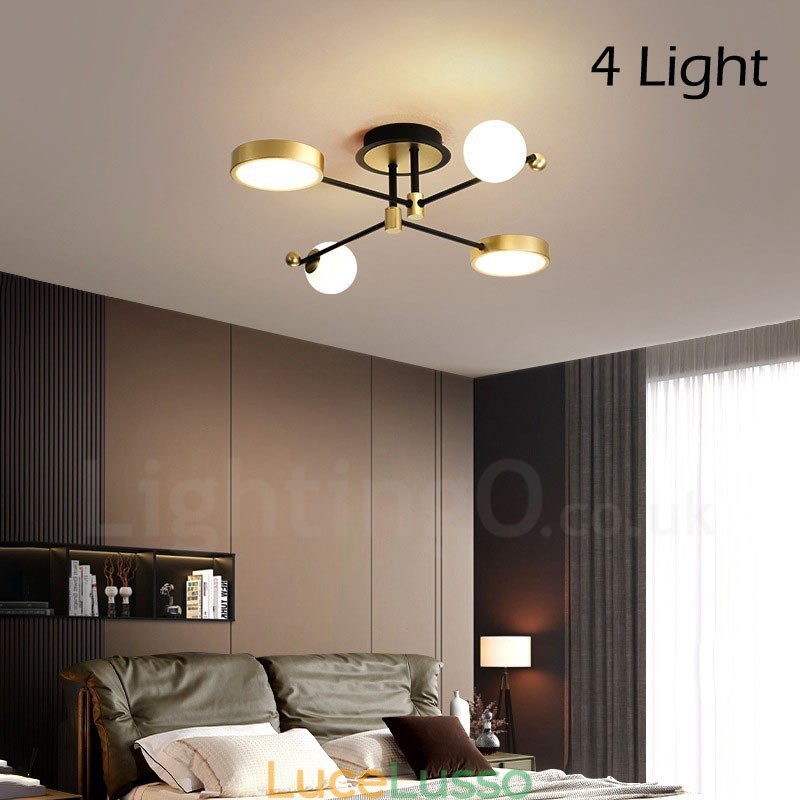 Lampadario moderno in metallo con soffitto nero oro