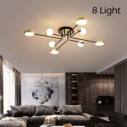 Lampadario moderno in metallo con soffitto nero oro