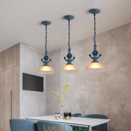 Una luce a sospensione antica retrò artistica rustica azzurra con paralume in vetro Una luce a sospensione antica retrò artistica rustica azzurra con paralume in vetro
