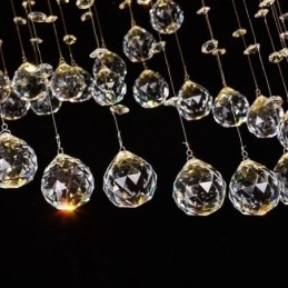 Lampadario moderno in cristallo con luce a goccia rotonda