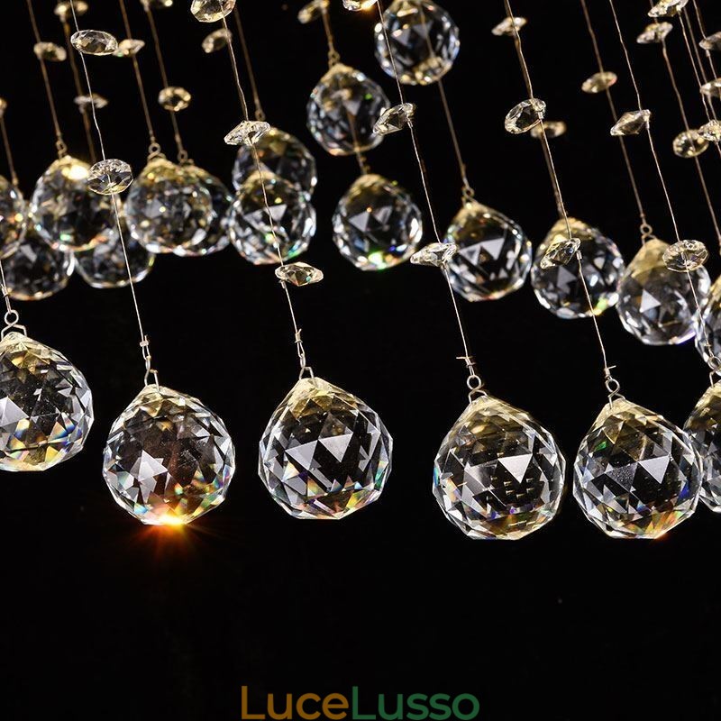 Lampadario moderno in cristallo con luce a goccia rotonda