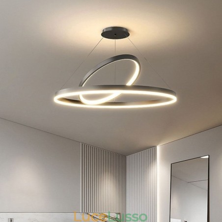 Lampada a sospensione moderna con anelli circolari in acrilico Lampada a sospensione moderna con anelli circolari in acrilico