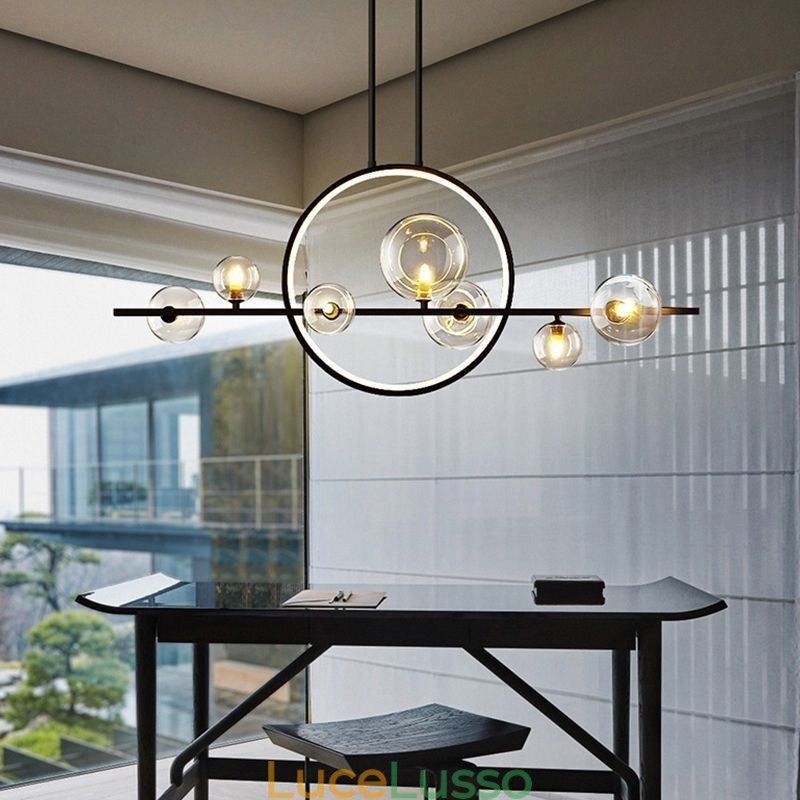 Lampadario moderno in metallo con bolle di vetro trasparente