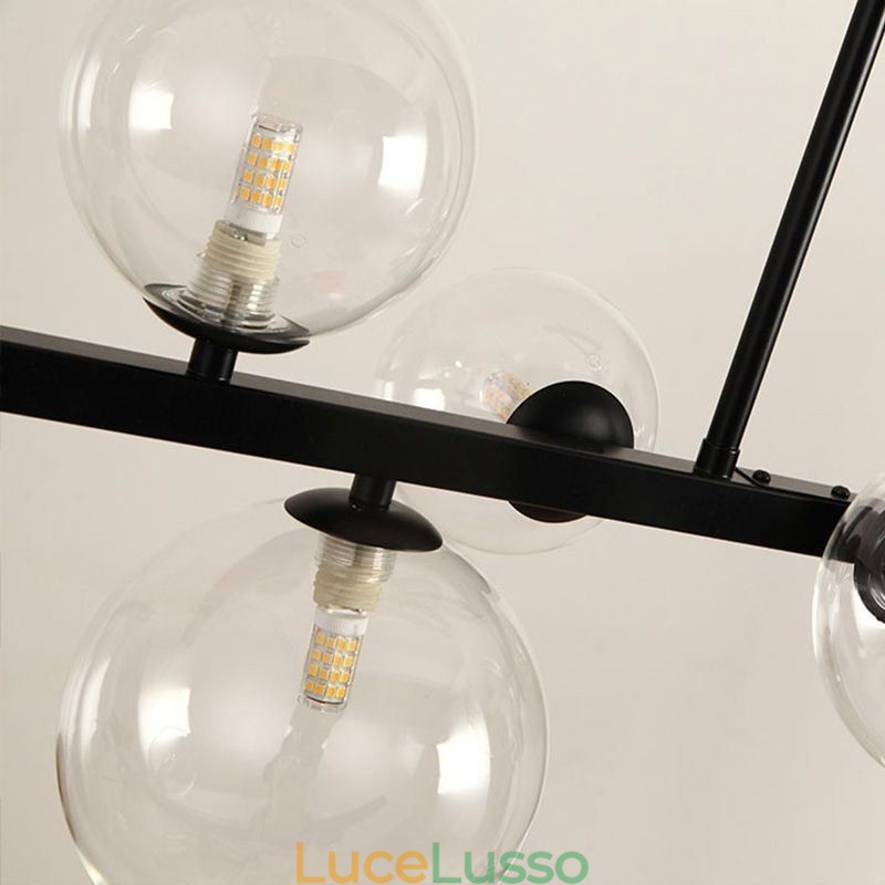 Lampada a sospensione moderna a bolle di vetro con staffa lunga nera