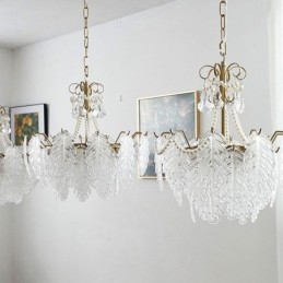 Elegante lampada a sospensione in vetro a forma di foglia