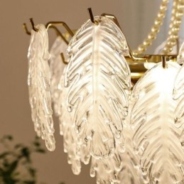 Elegante lampada a sospensione in vetro a forma di foglia