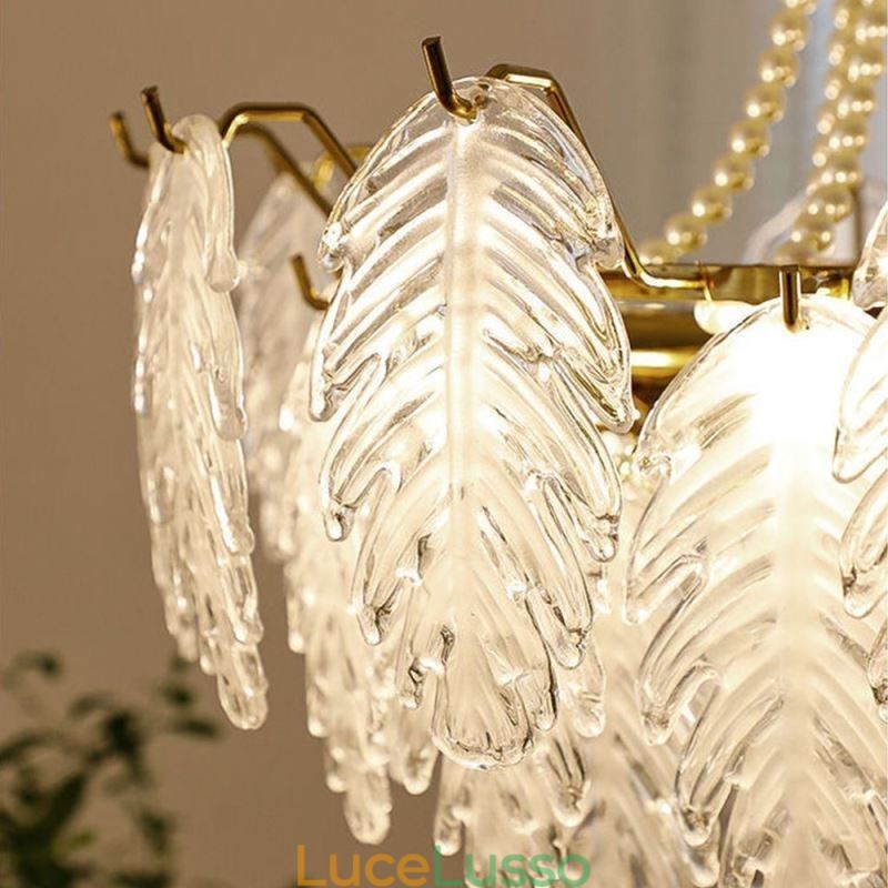 Elegante lampada a sospensione in vetro a forma di foglia