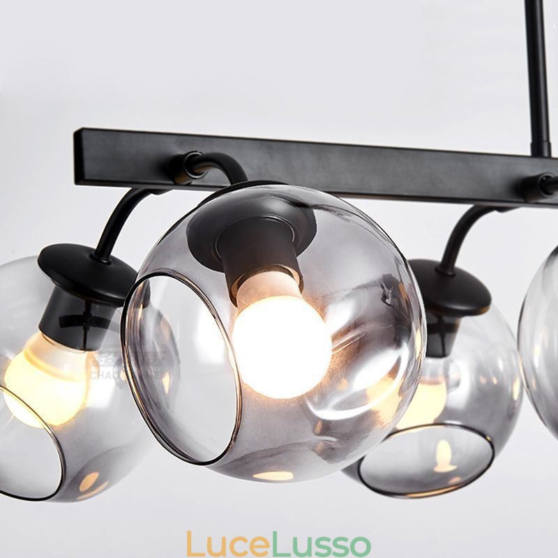 Lampada a sospensione Magic Bean in vetro con globo di illuminazione