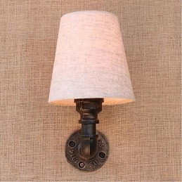 Applique da parete rustica in ottone per luce ambientale