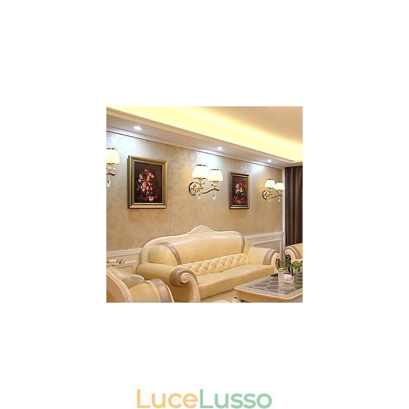 Applique da parete moderne e contemporanee con funzione elettrolitica per luce ambientale in cristallo
