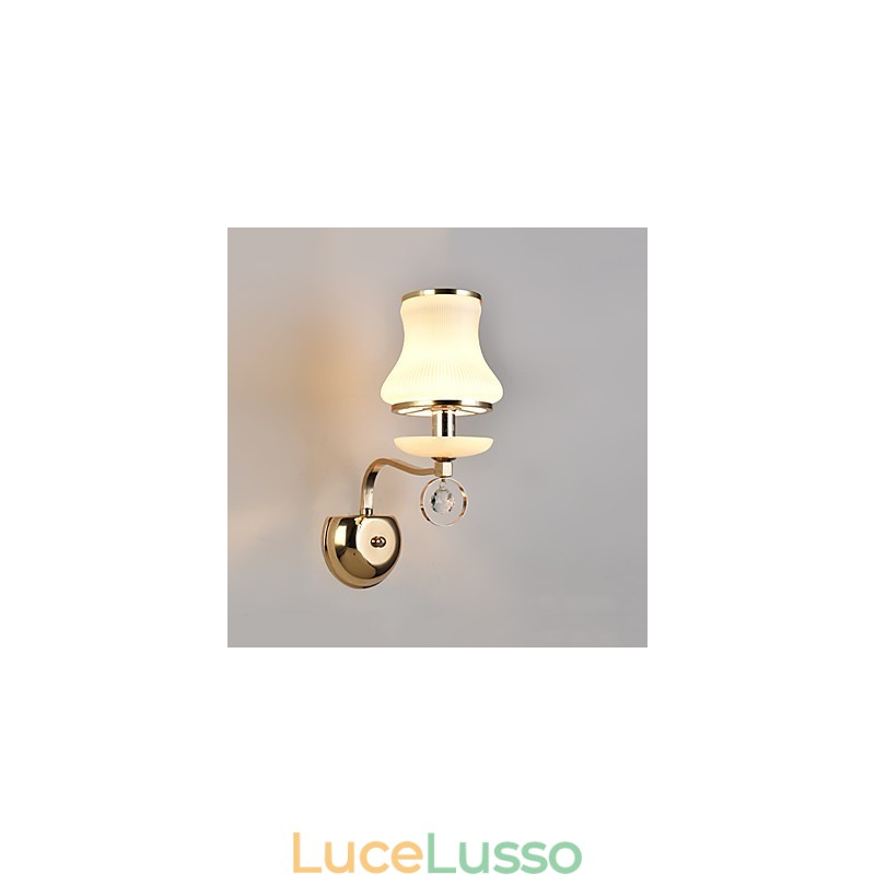 Applique da parete moderna e contemporanea con funzione elettroplaccata per luce ambientale in cristallo