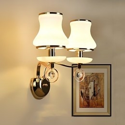 Applique da parete moderne e contemporanee con funzione elettrolitica per luce ambientale in cristallo