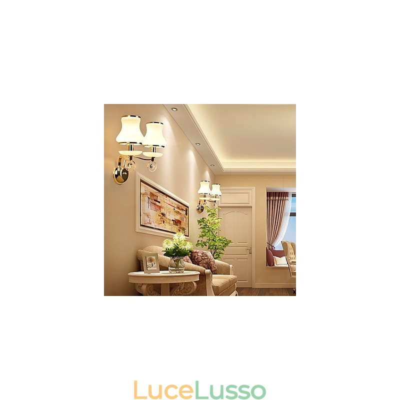 Applique da parete moderne e contemporanee con funzione elettrolitica per luce ambientale in cristallo