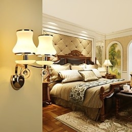 Applique da parete moderne e contemporanee con funzione elettrolitica per luce ambientale in cristallo