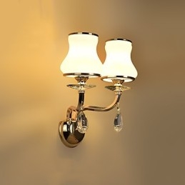 Applique da parete moderne e contemporanee con funzione elettrolitica per luce ambientale in cristallo