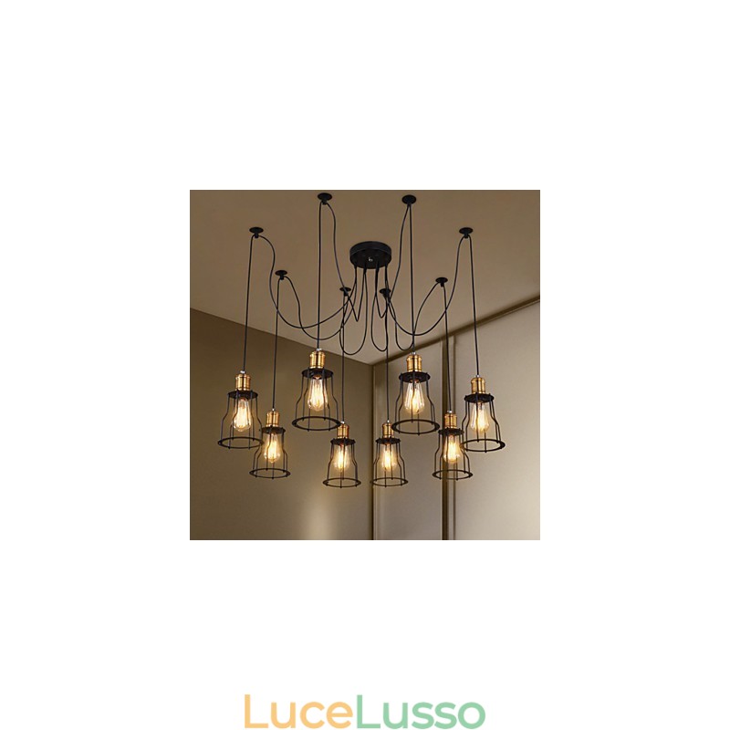 Designer di campagna che dipingono lampadari in metallo