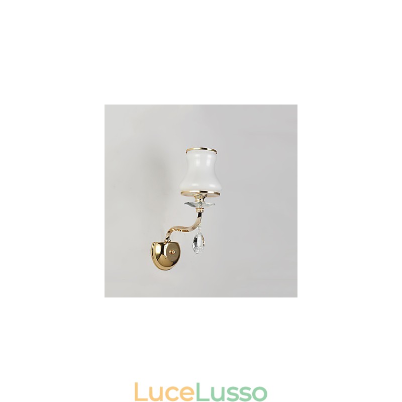 Applique da parete moderna e contemporanea con funzione elettroplaccata per luce ambientale in cristallo