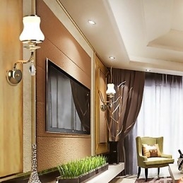 Applique da parete moderna e contemporanea con funzione elettroplaccata per luce ambientale in cristallo