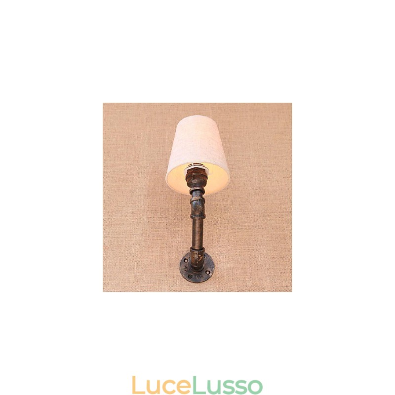 Applique da parete rustica in ottone per luce ambientale