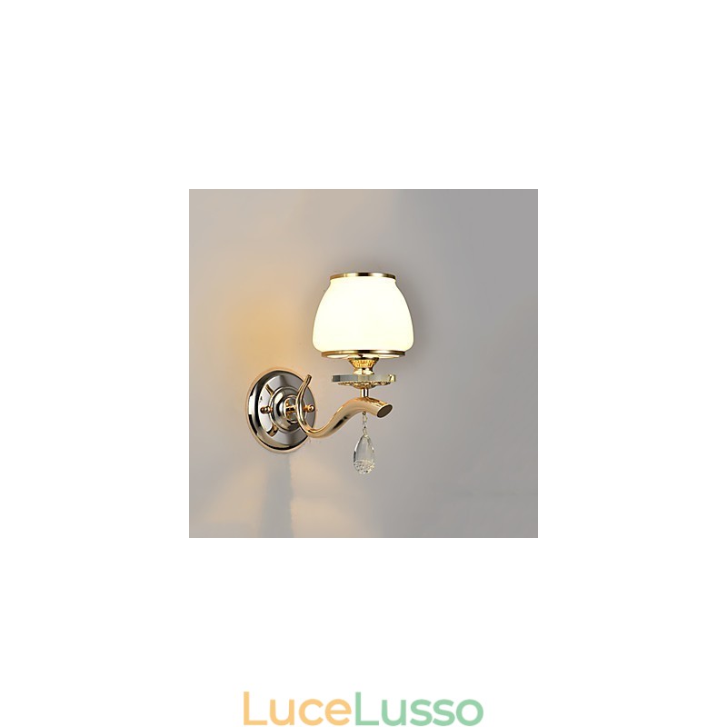 Applique da parete moderna e contemporanea con funzione elettroplaccata per luce ambientale in cristallo