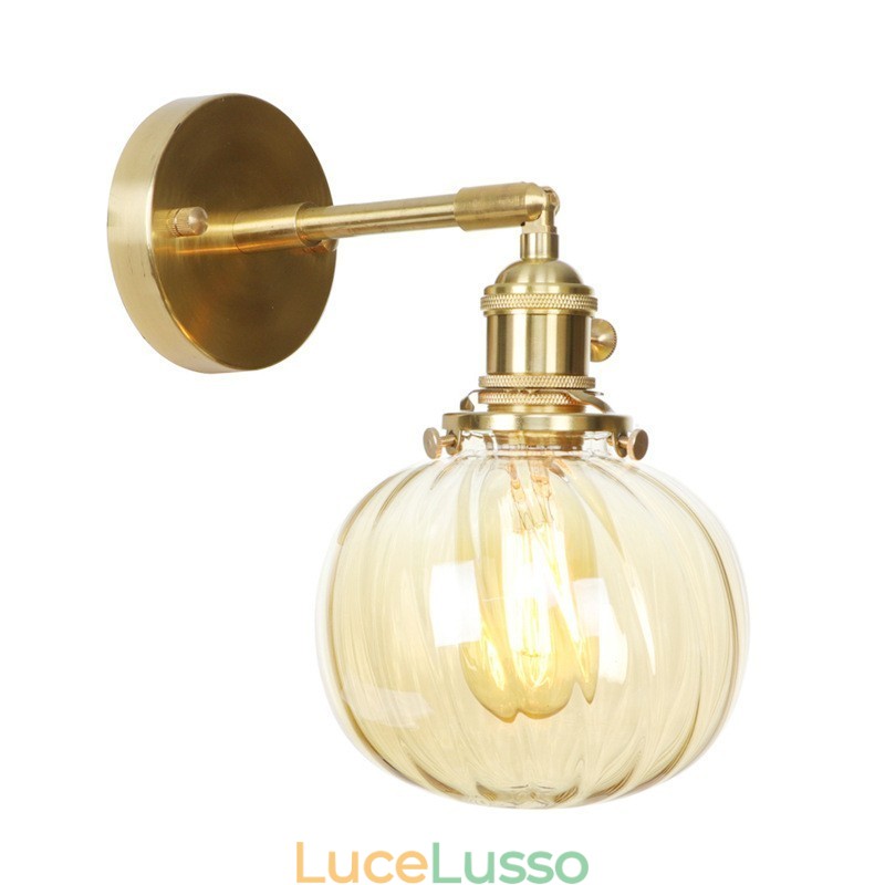 Applique moderna Bean con paralume in vetro sferico