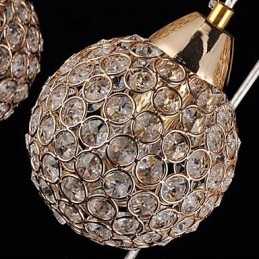 Lampada a sospensione moderna e contemporanea in metallo elettroplaccato con cristallo a globo
