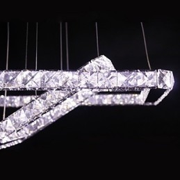 Lampada a sospensione moderna in metallo e cristallo contemporaneo